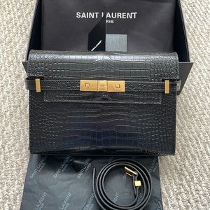 Saint Laurent Manhattan embossed shoulder bag. What you see is what you get.